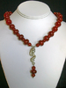 Sterling silver:  Asian Dragon with Red Dragon Vein Agate beads
